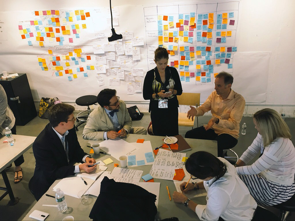 People discussing around a table