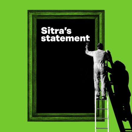 A man standing on a ladder is writing on a board Sitra's statement