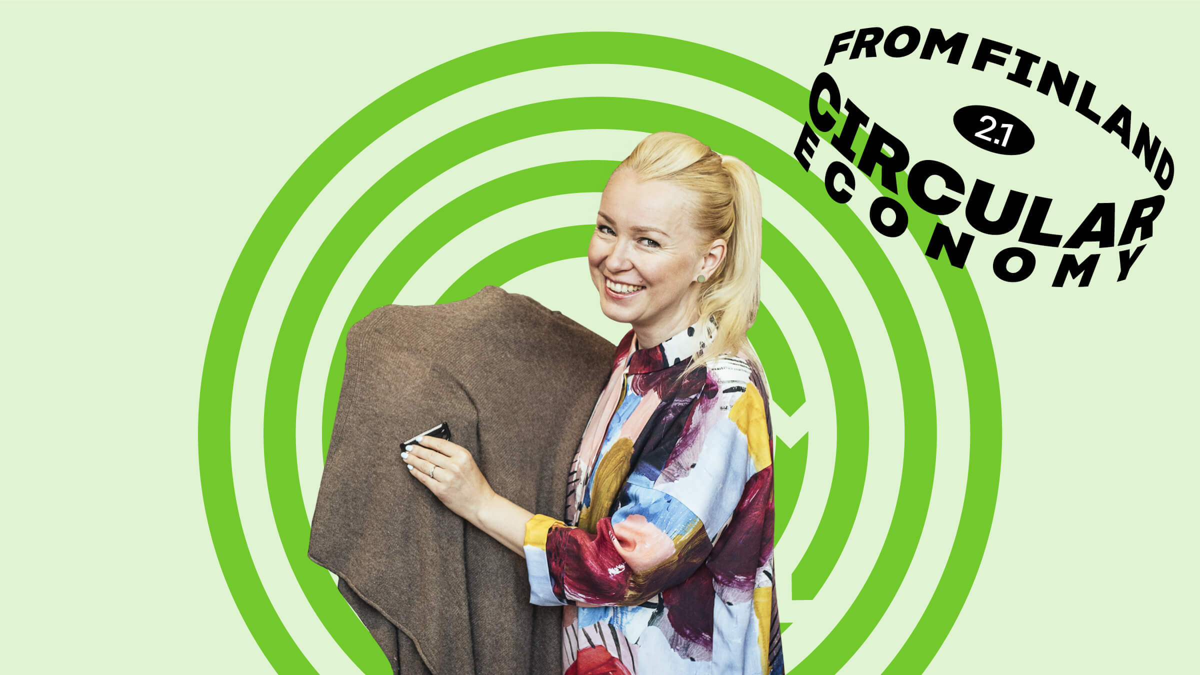 Vaatepuu's founder Soile-Maria Linnemäki on a green background with clothes.