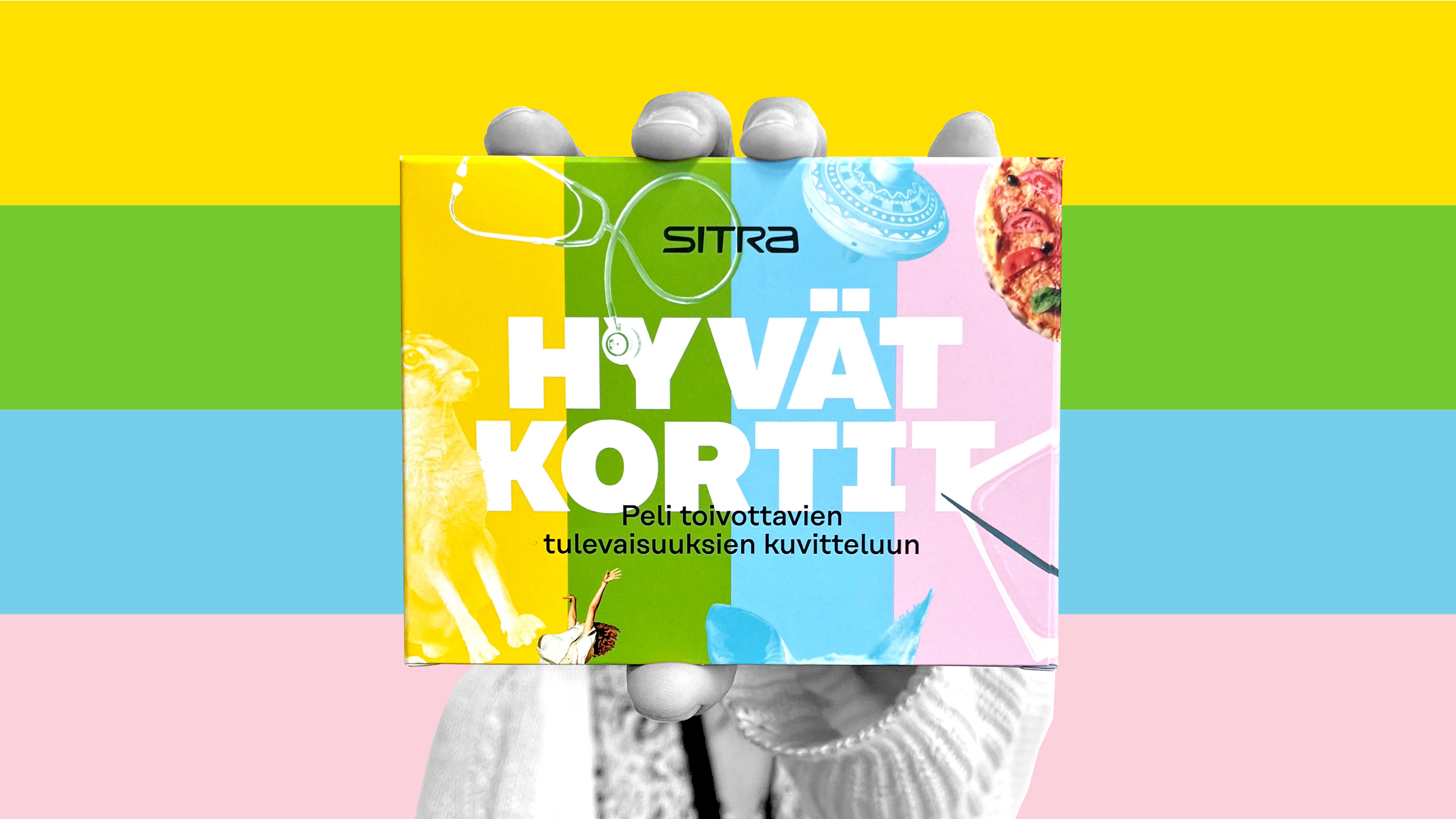 Hyvät kortit -korttipakka ja käsi, joka pitelee pakkaa