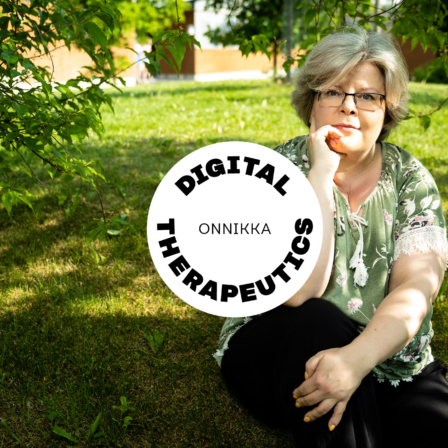 Tarja Viitanen sits on the lawn, with a building and trees in the background. On top is a sticker that says digital therapeutics.s.