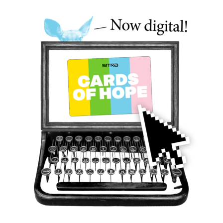 The photo includes an old typewriter with a screen displaying a card with the text cards of hope.