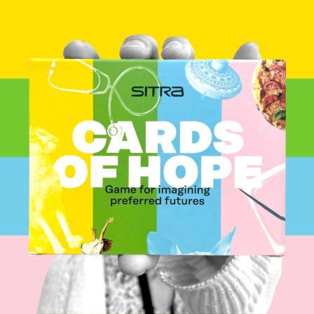 Hand holding Cards of Hope game