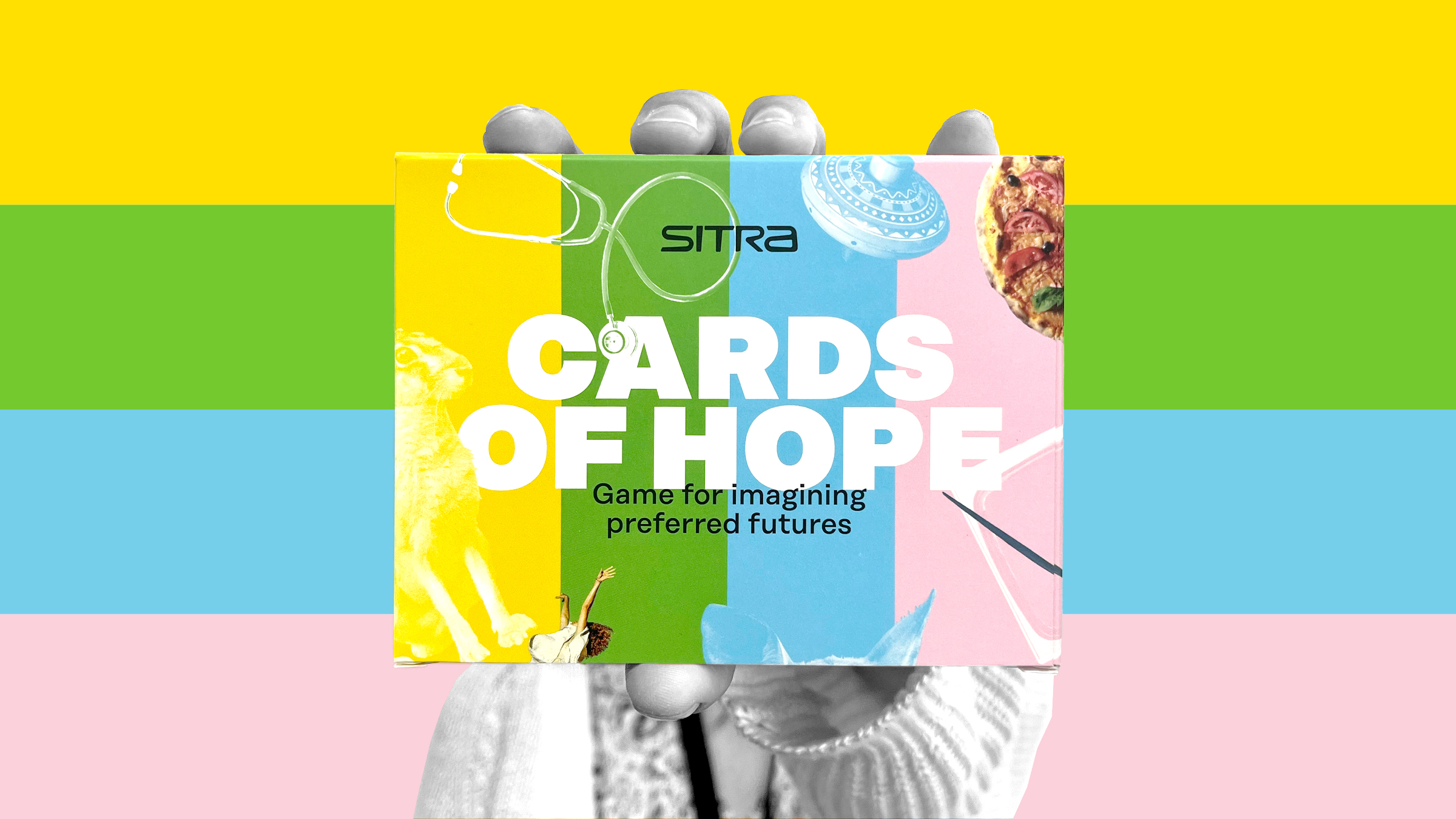 Hand holding Cards of Hope game