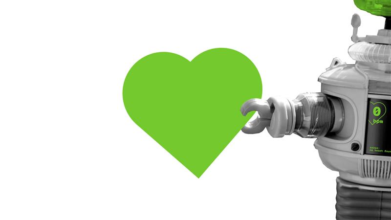 A green heart in the robot's hand